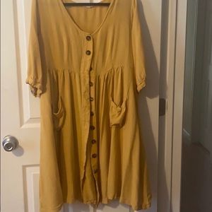 Oddy button up dress with pockets.